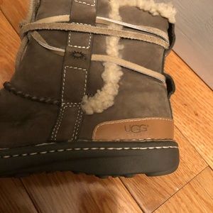 Ugg booties with string tie. Super warm and comfy.